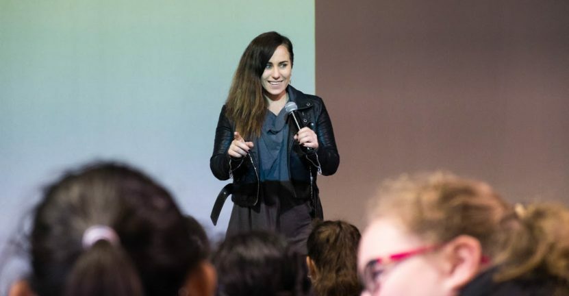 Placeholder Lucy talking with a microphone